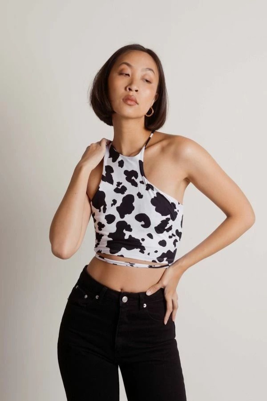 * Tobi Herd Ya Black & White Cow Asymmetrical Halter Crop Top | Crop Tops